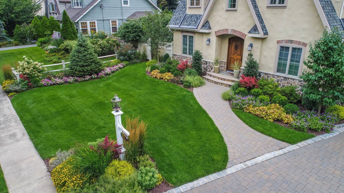 pictures of landscapes in front of houses